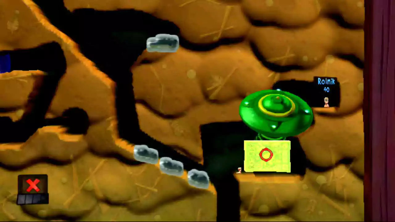 Ustawienie obiektu fizycznego w celu wykorzystania go jako platformy w łamigłówce numer 19 (Czyj to ogród) w grze Worms Revolution Extreme